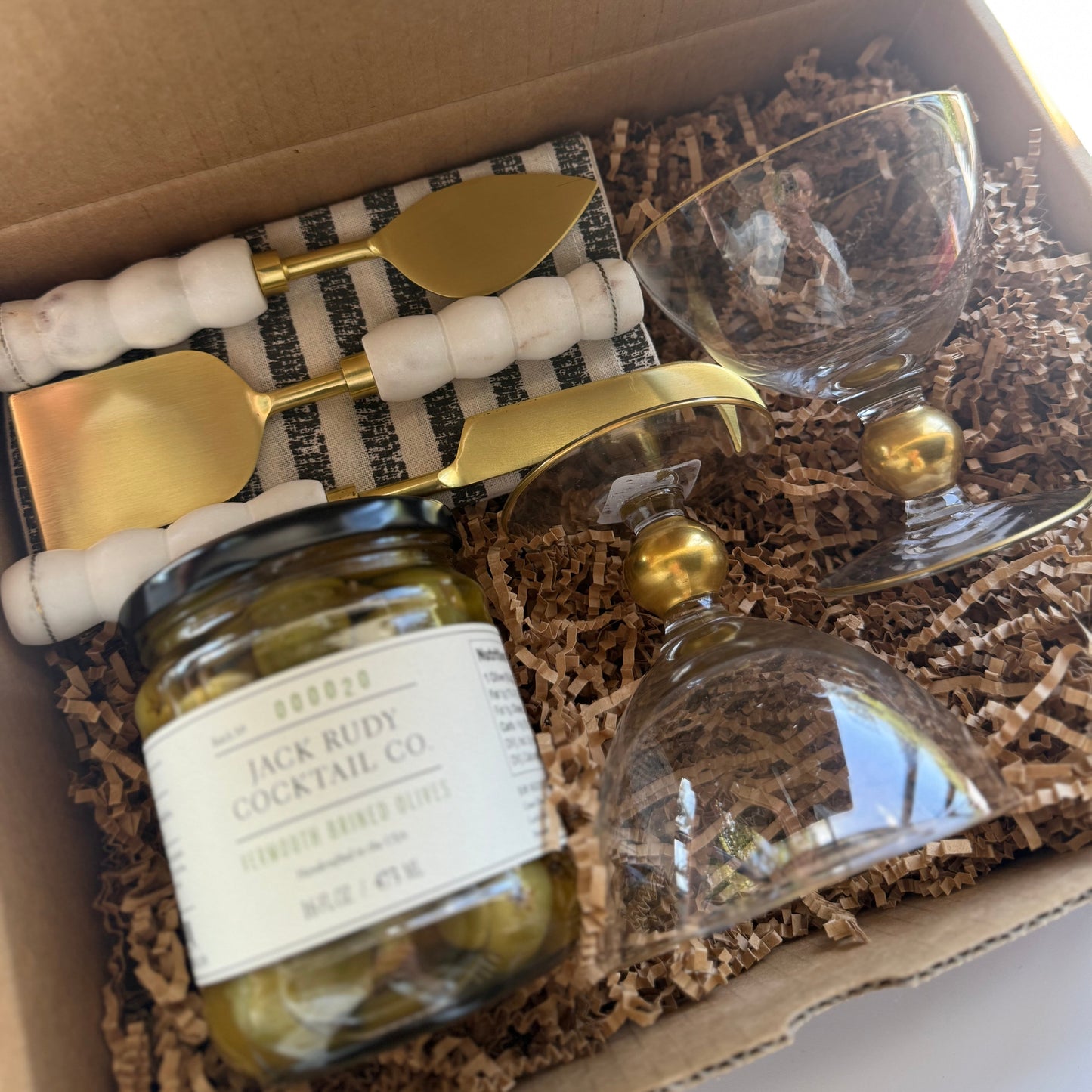 Gift set with jars, glasses, and cutlery in a box