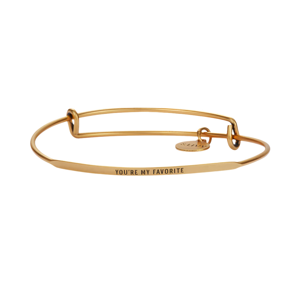 Gold bracelet with 'YOU'RE MY FAVORITE' text on a white background