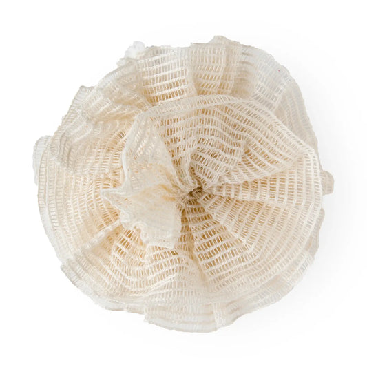 Beige woven basket on a white background