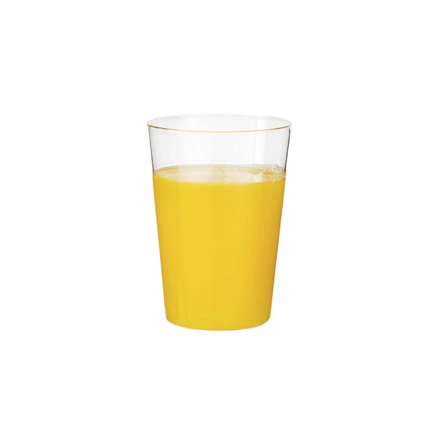 Clear glass filled with yellow liquid on a white background