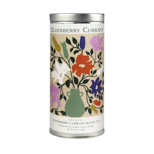 Tea canister with floral design and 'Elderberry Currant' text on a light gray background