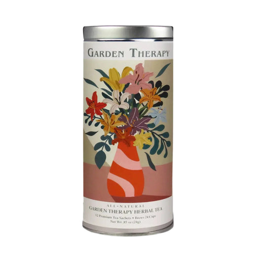Tea canister with floral design and 'Garden Therapy' branding on a light gray background