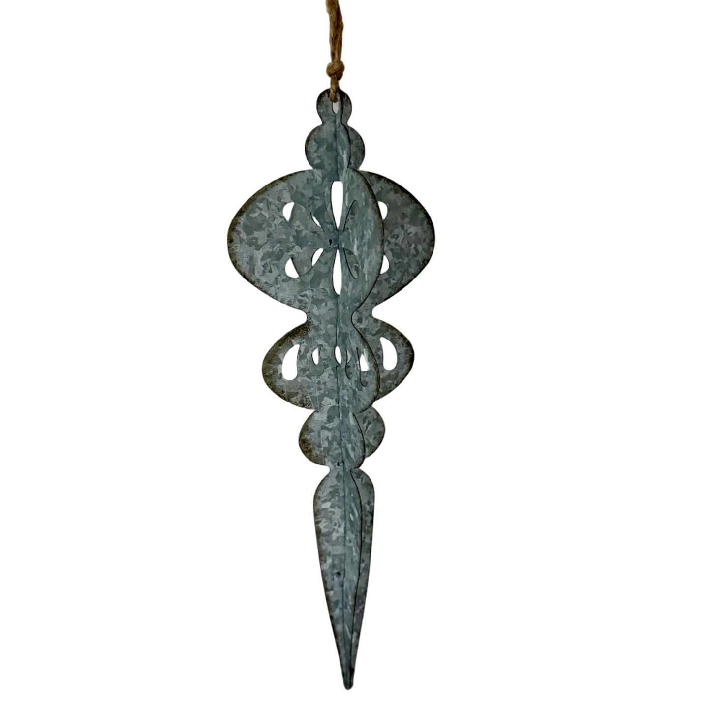 Decorative metal hanging ornament on a plain background