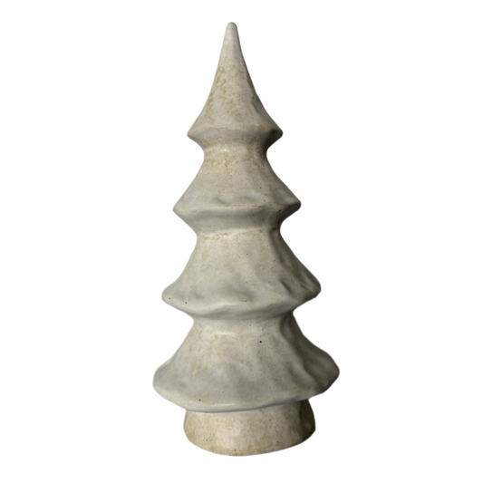 Ceramic Christmas tree ornament on a plain background