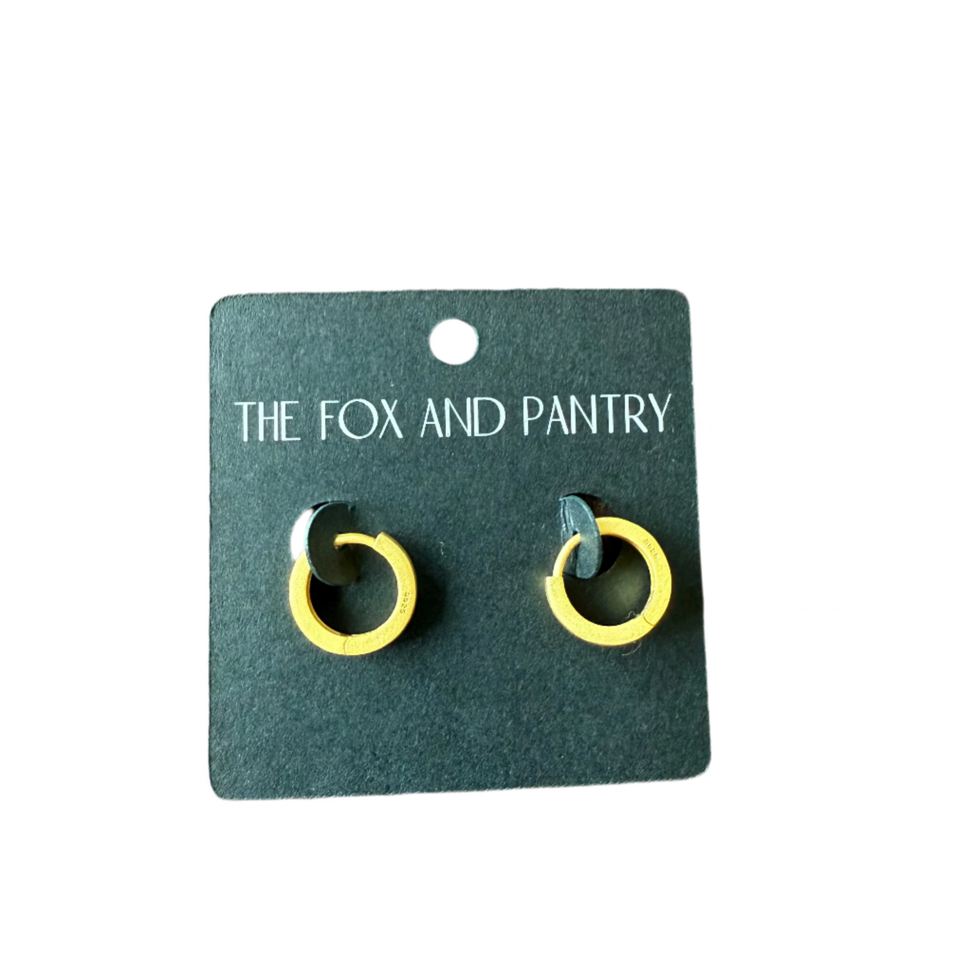 Pair of yellow and black earrings on a 'The Fox and Pantry' branded card, placed on a wooden surface.