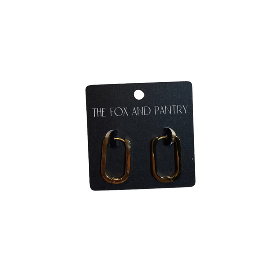 Pair of gold hoop earrings on a 'The Fox and Pantry' branded card against a neutral background