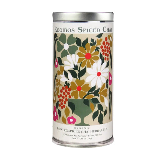 Tea canister with floral design on a white background