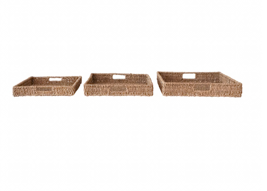 Three woven baskets of different sizes on a white background