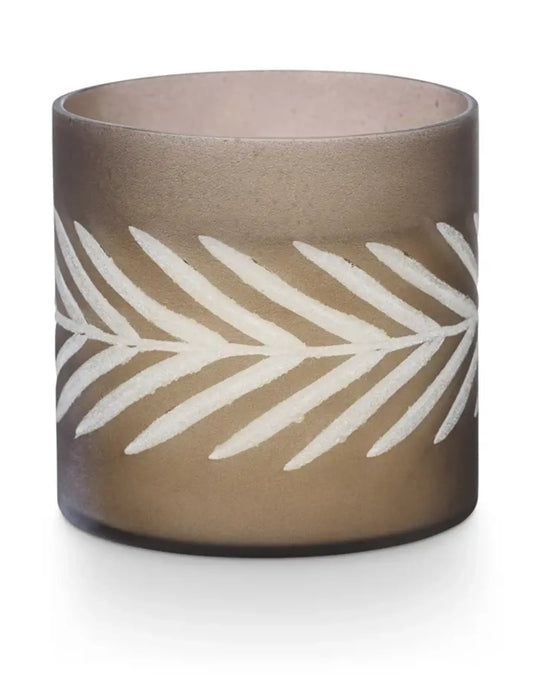 Ceramic planter with white leaf pattern on a beige background