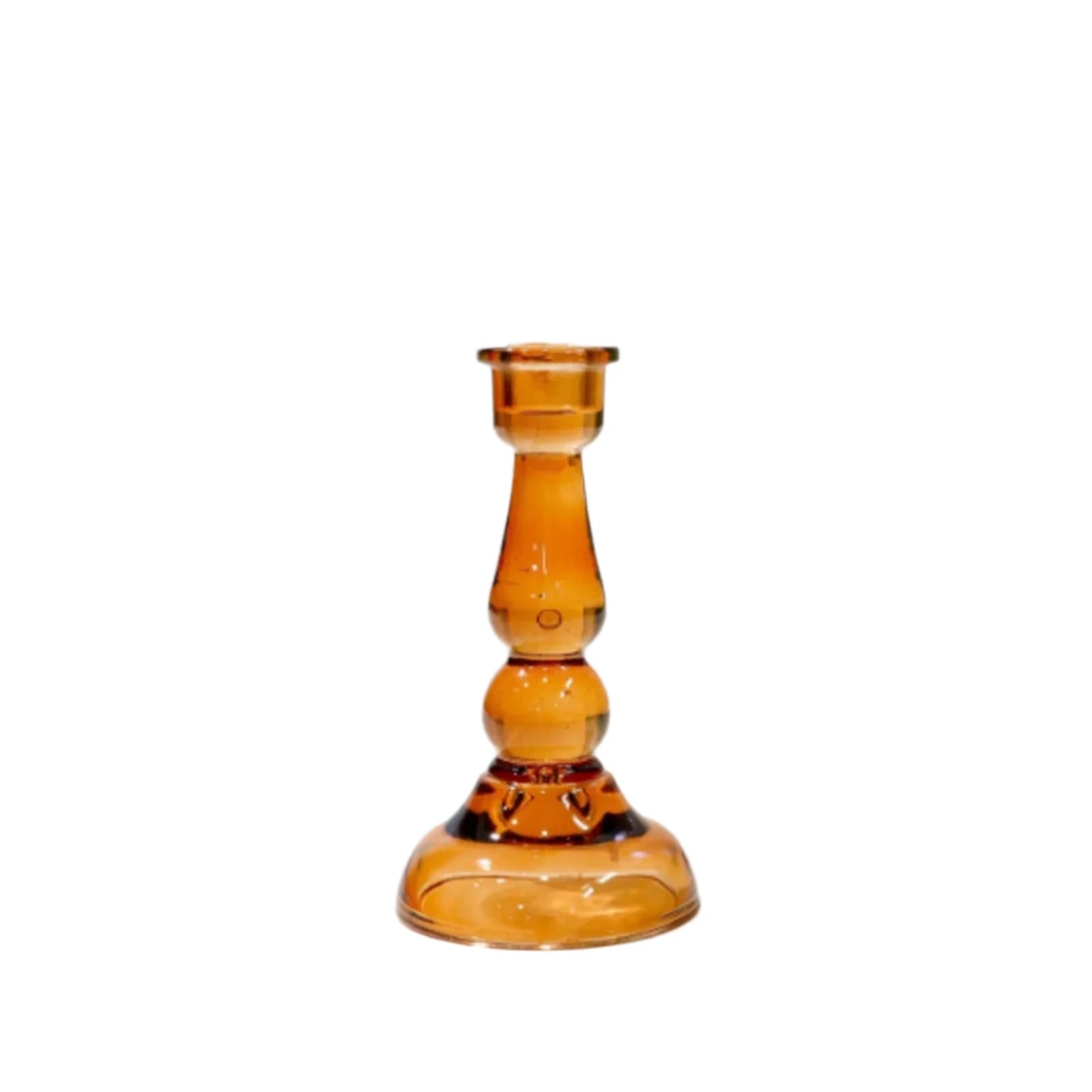 Amber glass candle holder on a white background